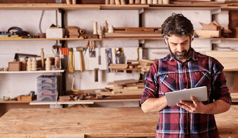 Man in woodworking shop