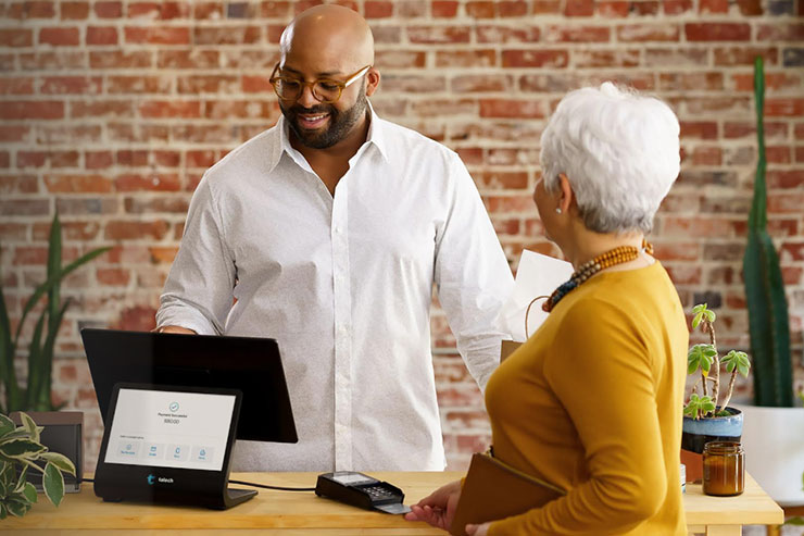 Business owner with customer